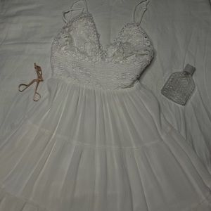 White flowey dress, low tie back